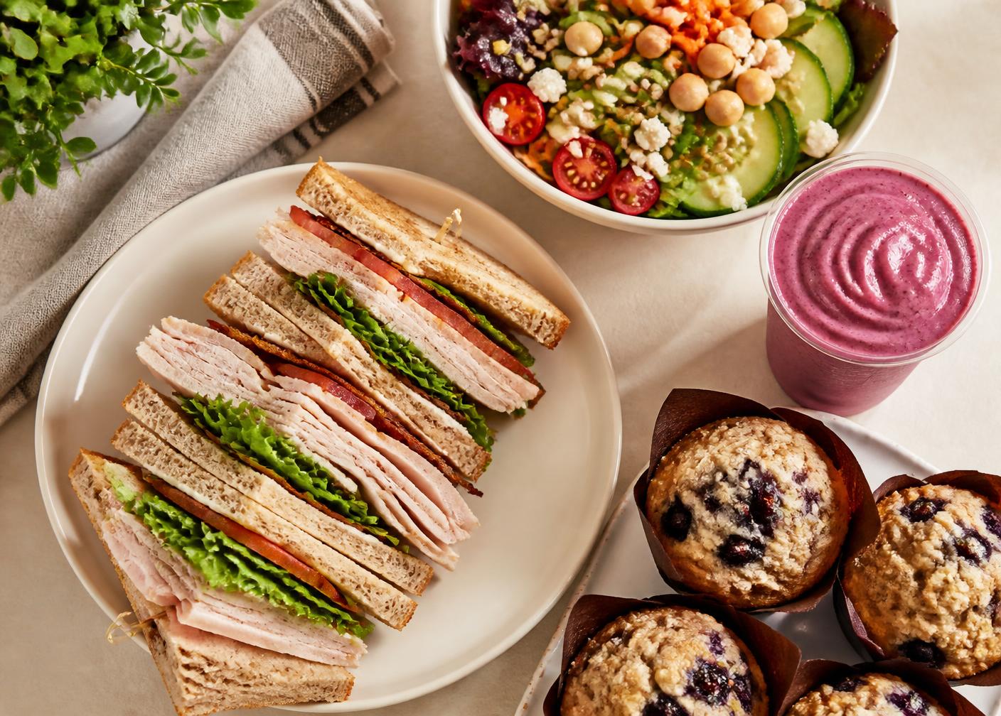 Turkey club sandwich, garden salad, berry smoothie and blueberry muffins from Daily Harvest